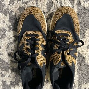 New Balance Black and Gold Patterned Sneakers